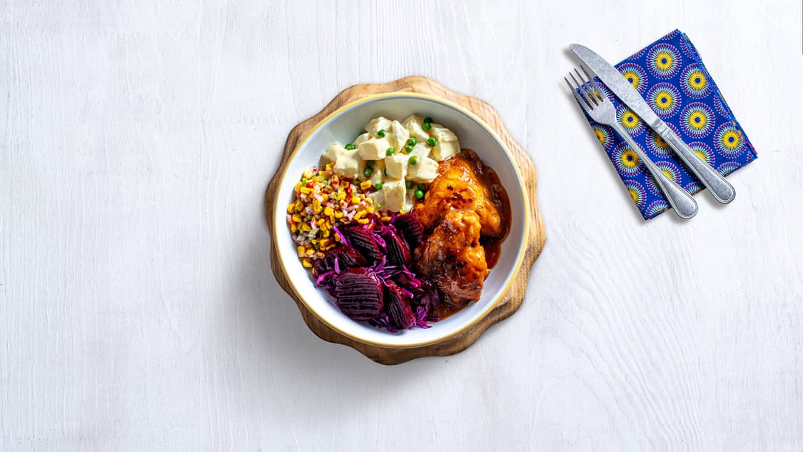 Chicken with potato salad and sides